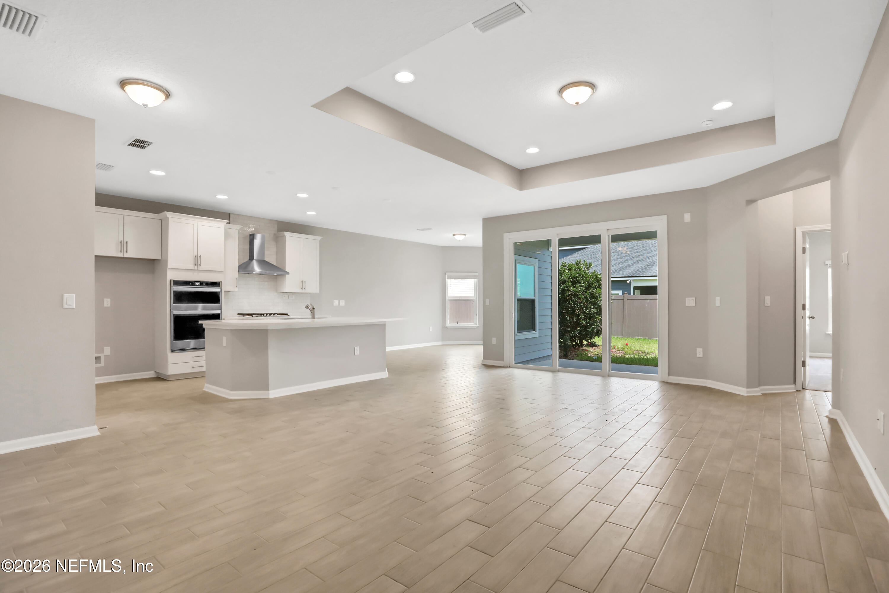 3157 Gadwall Road Orange Park, FL 32065 - Photo 16 of 36 a view of kitchen with refrigerator sink and large window