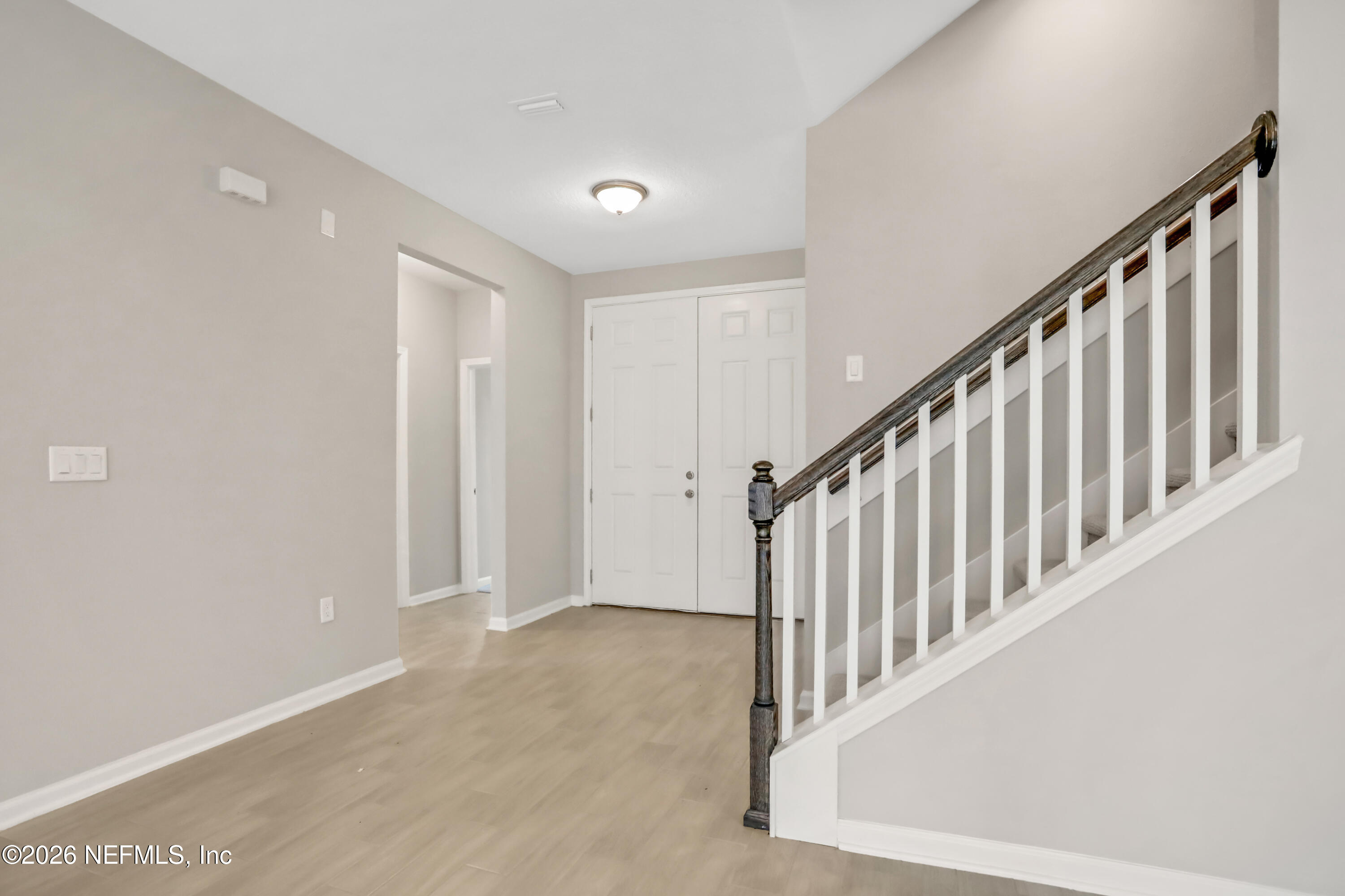 3157 Gadwall Road Orange Park, FL 32065 - Photo 18 of 36 a view of staircase with railing and white walls