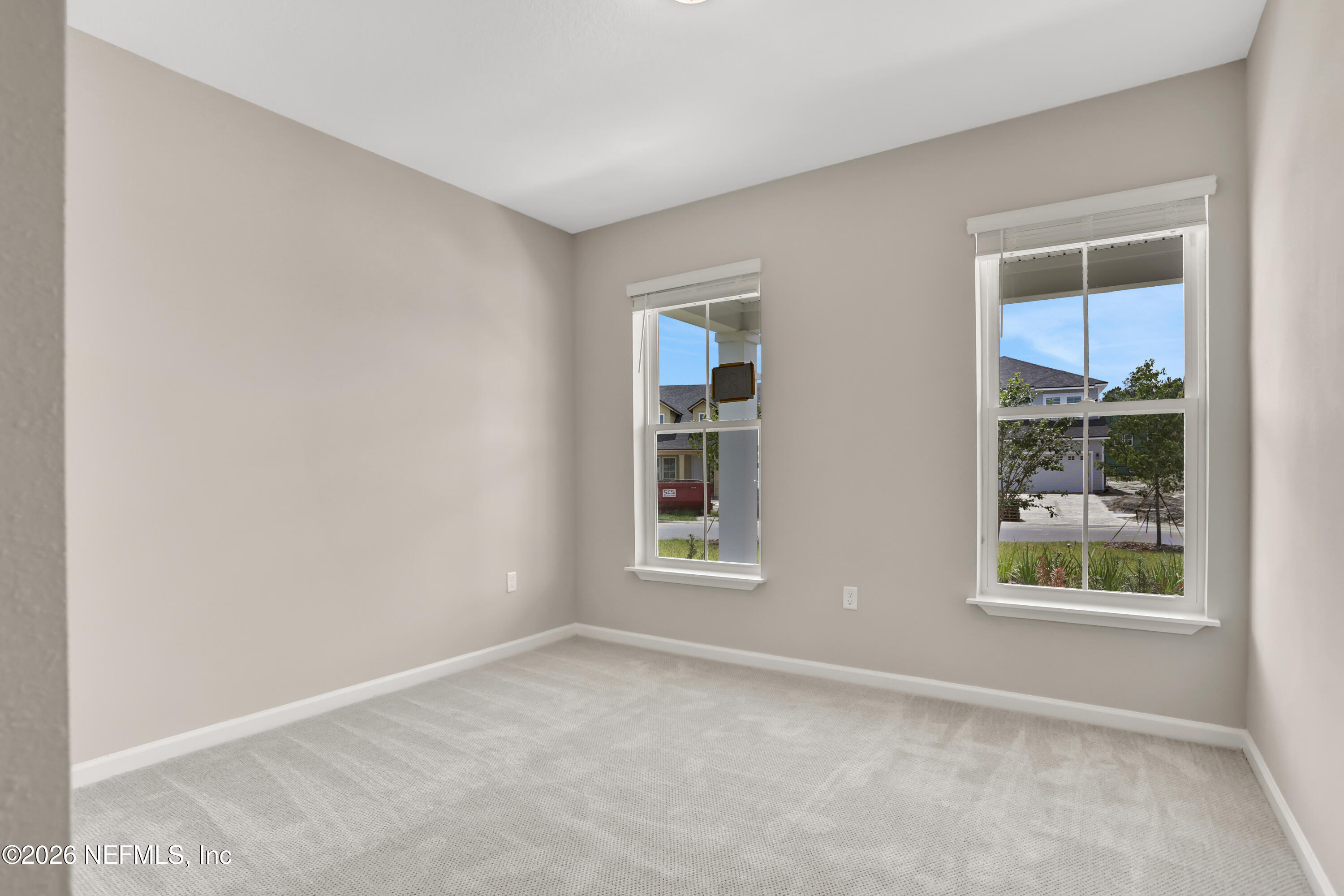 3157 Gadwall Road Orange Park, FL 32065 - Photo 20 of 36 an empty room with windows