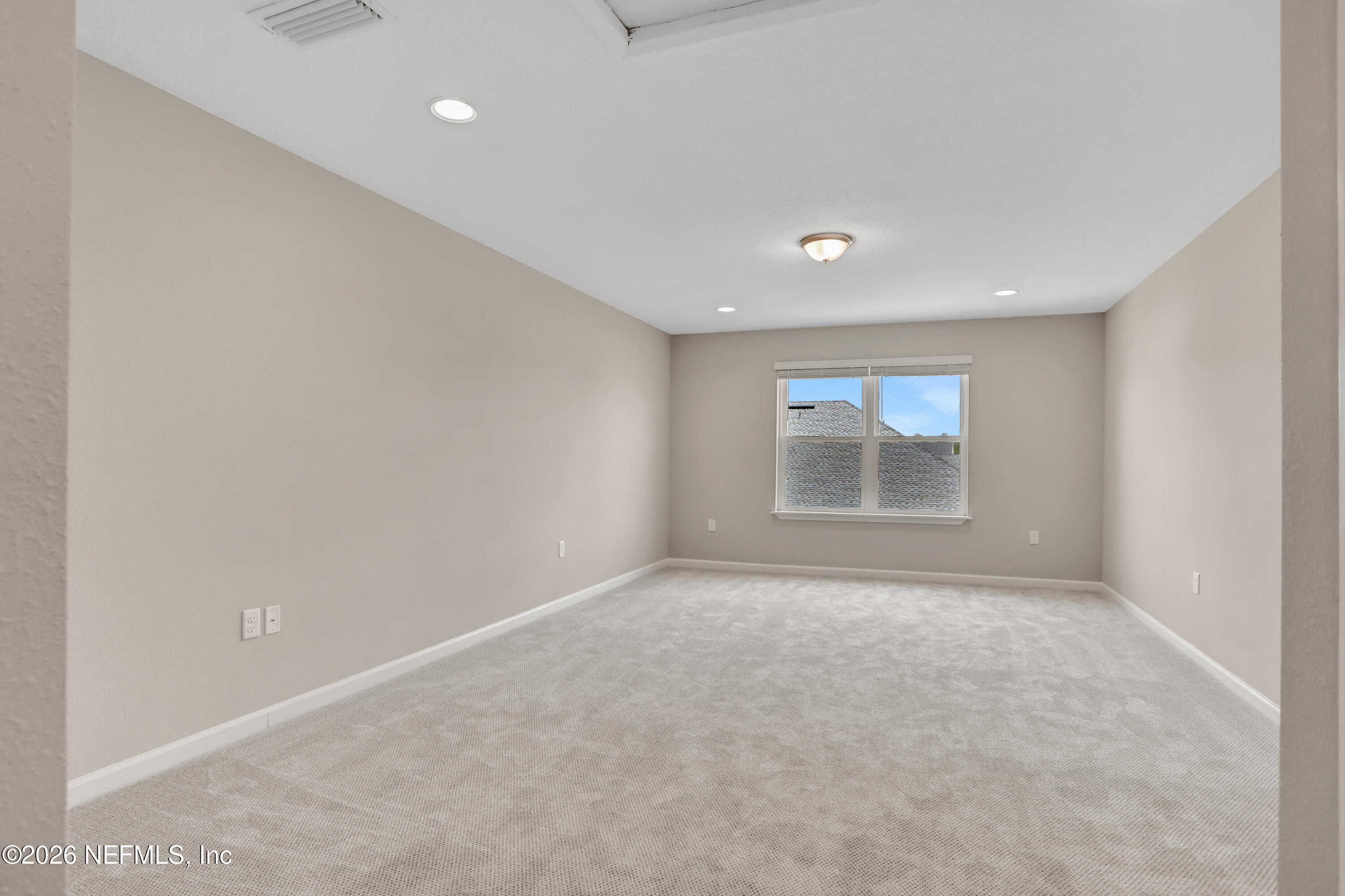 3157 Gadwall Road Orange Park, FL 32065 - Photo 30 of 36 a view of an empty room with a window