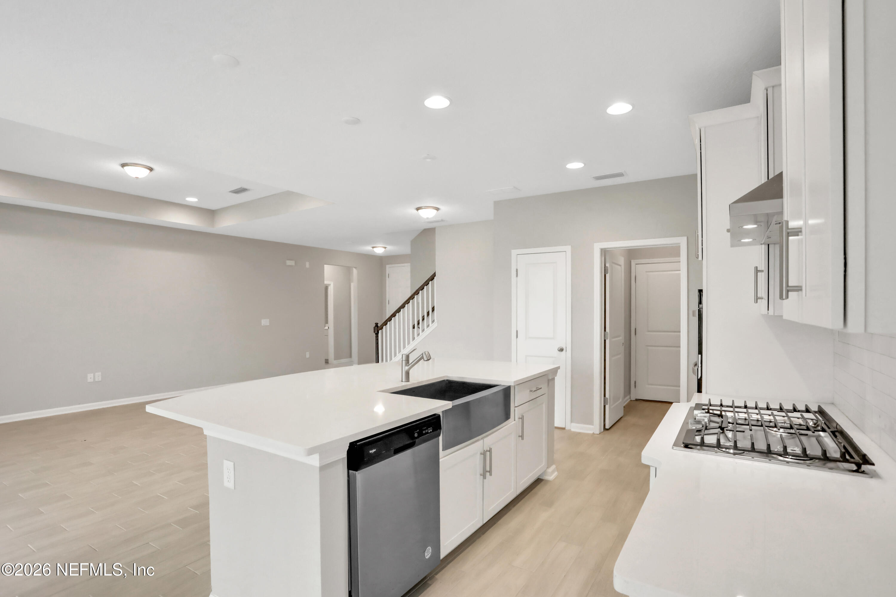 3157 Gadwall Road Orange Park, FL 32065 - Photo 6 of 36 a kitchen with granite countertop a sink and a stove top oven