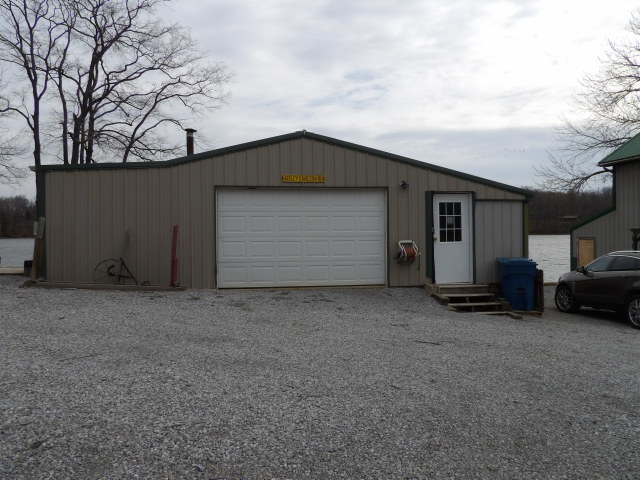 180 Morris Road Galatia, IL 62935 - Photo 24 of 28 a view of a house with a yard and garage