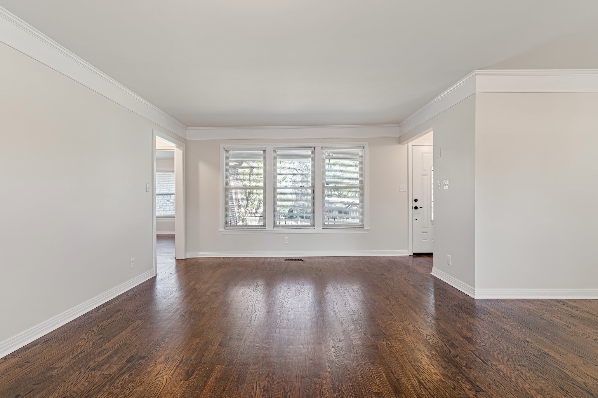 1002 Graymere Manor Road Columbia, TN 38401 - Photo 4 of 15 an empty room with wooden floor and windows