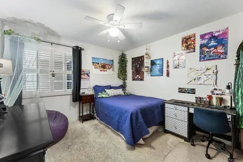a view of storage and utility room with washer and dryer