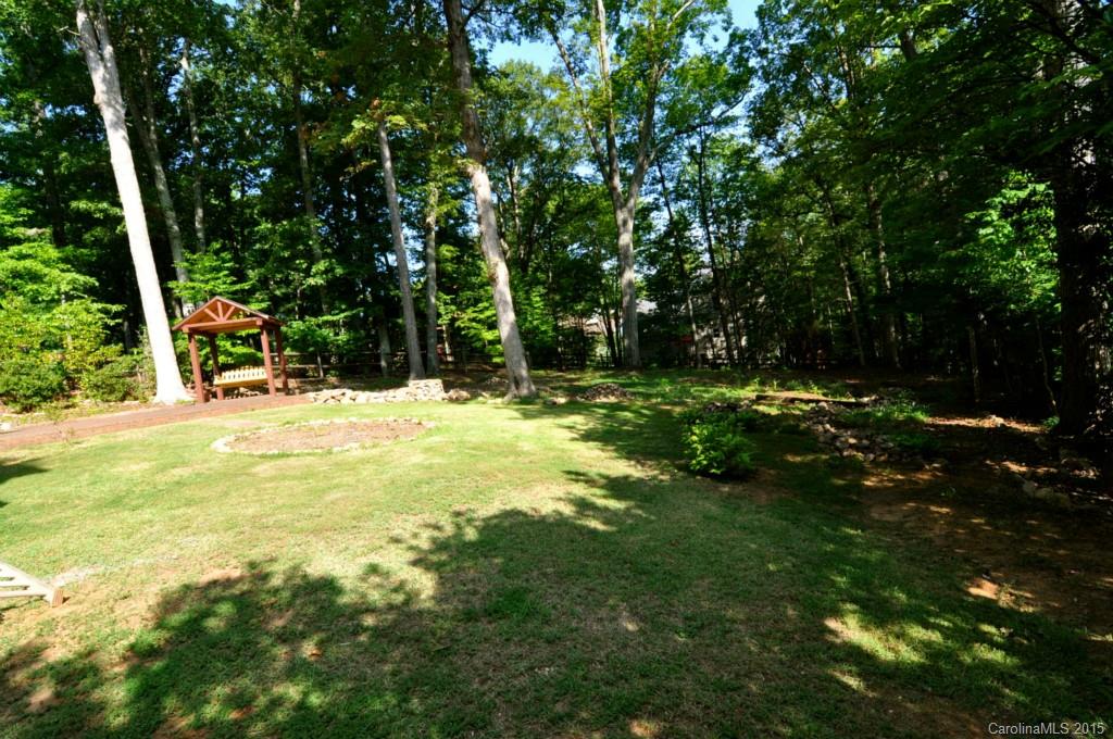 5015 Ridgetop Trail Charlotte, NC 28215 - Photo 2 of 24 a view of outdoor space with trees all around