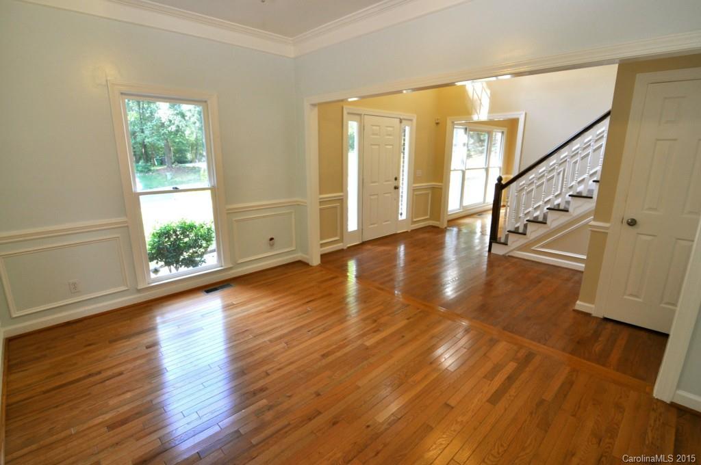 5015 Ridgetop Trail Charlotte, NC 28215 - Photo 5 of 24 a view of an entryway with wooden floor