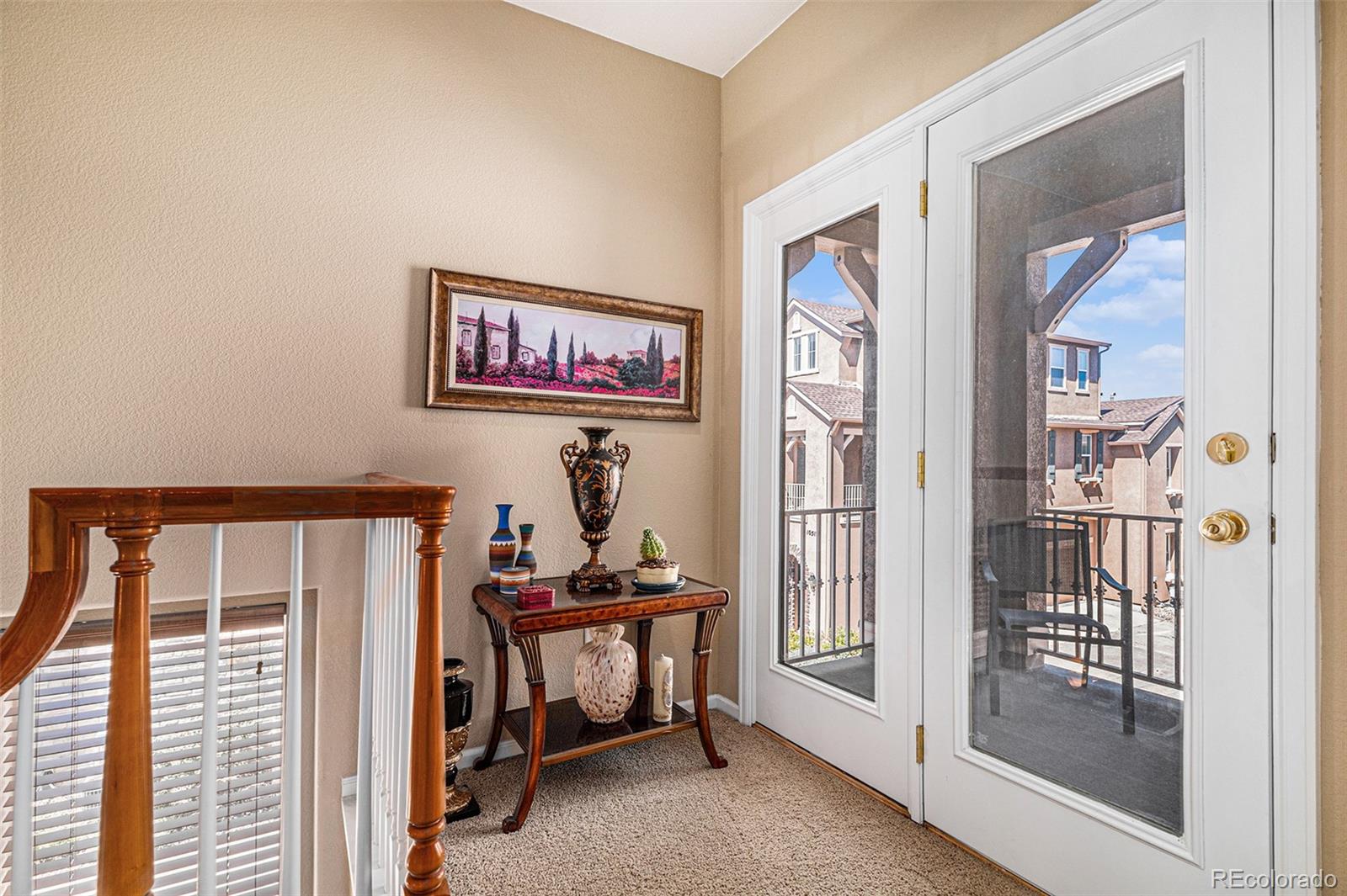 10515 Ashfield Street, Unit 1D Highlands Ranch, CO 80126 - Photo 9 of 39 a view of an entryway with a livingroom