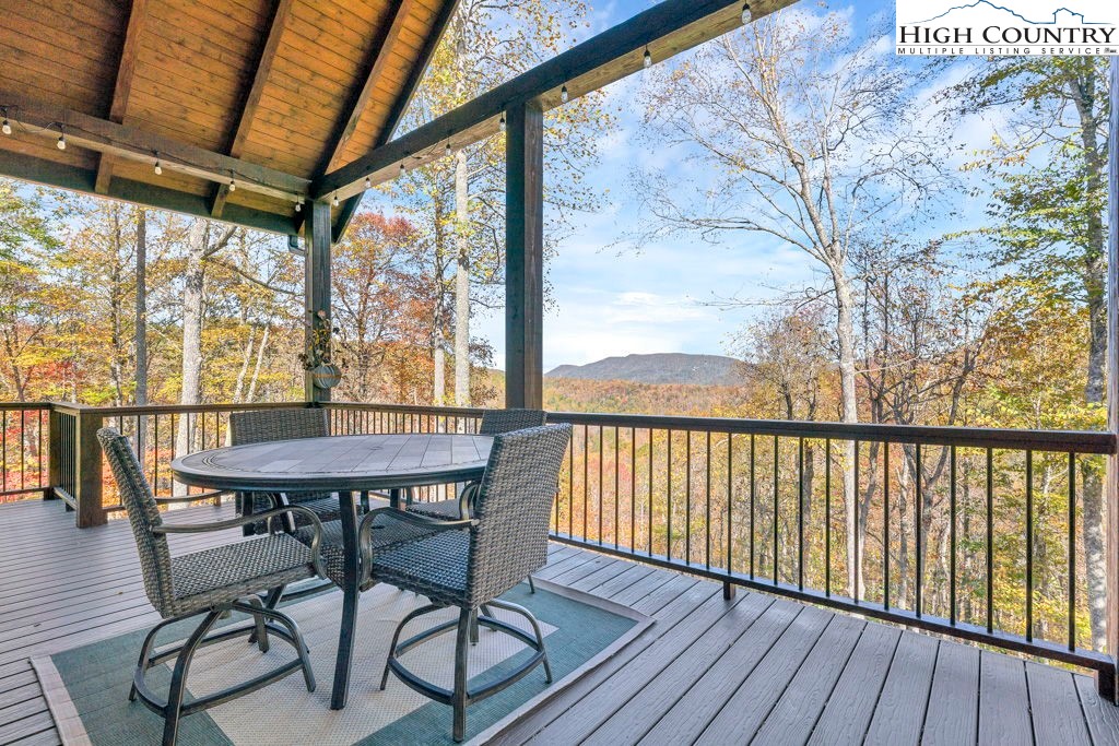322 South Creek Drive Boone, NC 28607 - Photo 18 of 50 a view of a balcony with furniture