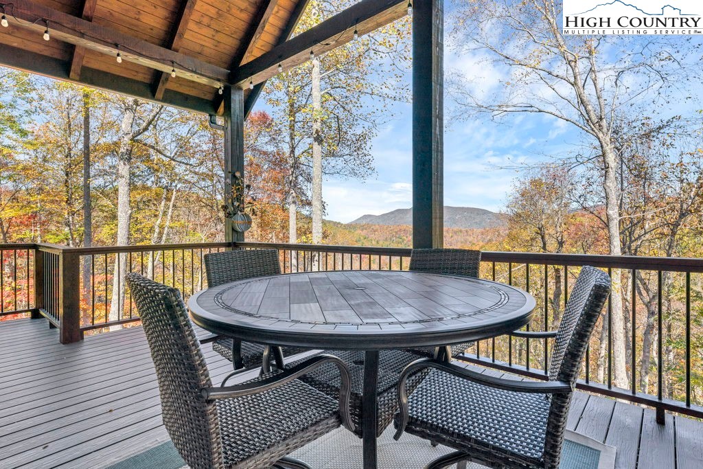 322 South Creek Drive Boone, NC 28607 - Photo 20 of 50 a view of balcony with furniture and wooden floor