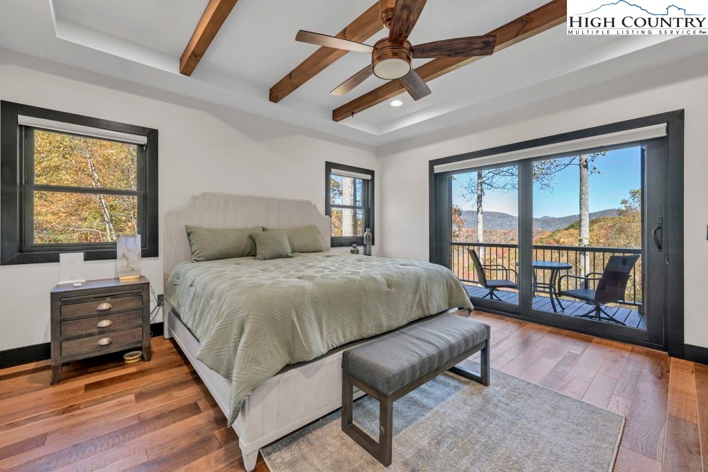 322 South Creek Drive Boone, NC 28607 - Photo 21 of 50 a bedroom with a bed and a window