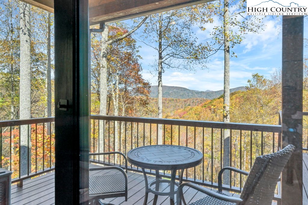 322 South Creek Drive Boone, NC 28607 - Photo 24 of 50 a view of a balcony with furniture and wooden floor