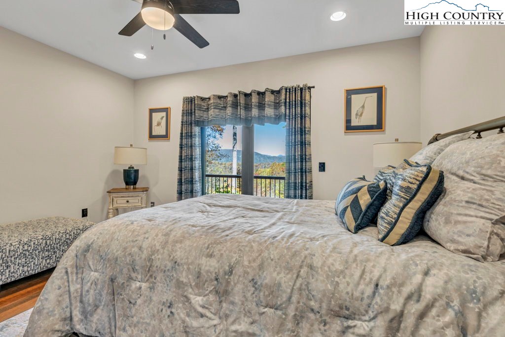 322 South Creek Drive Boone, NC 28607 - Photo 38 of 50 a bedroom with a bed and a large window