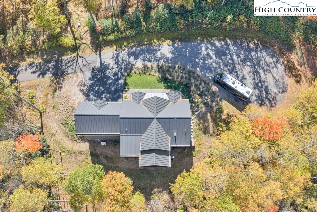 322 South Creek Drive Boone, NC 28607 - Photo 43 of 50 a aerial view of a house with a yard and a large tree