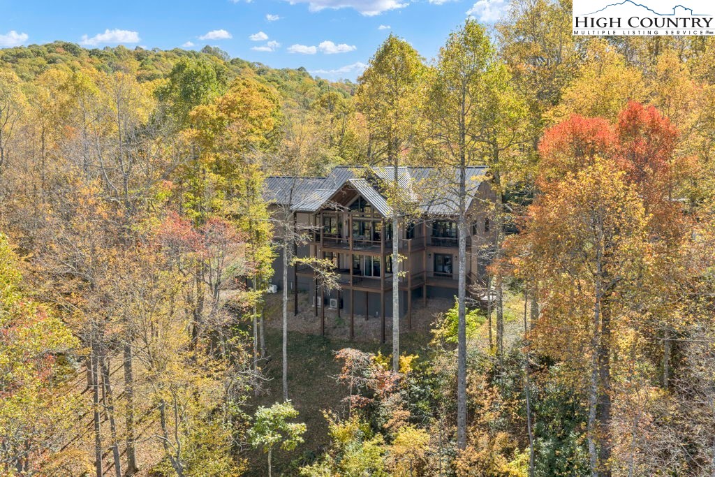 322 South Creek Drive Boone, NC 28607 - Photo 44 of 50 a aerial view of a house with a yard and large trees