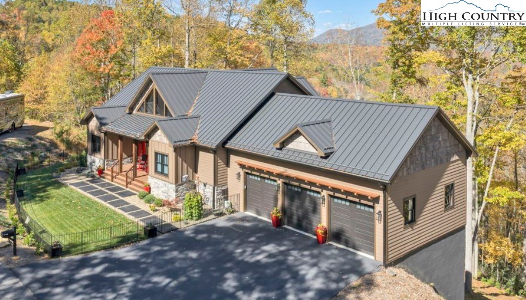 322 South Creek Drive Boone, NC 28607 - Photo 49 of 50 a front view of a house with a yard