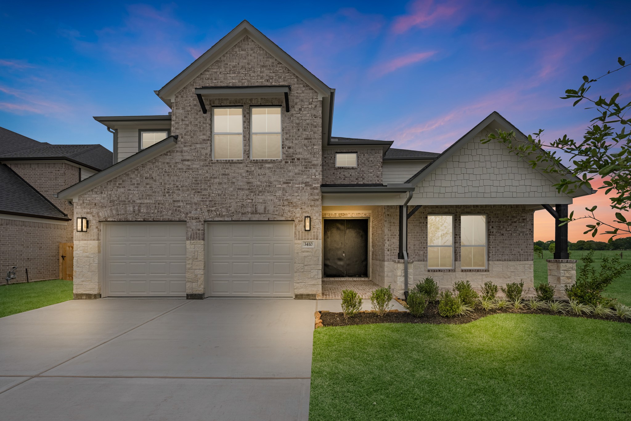 3410 Everglade Lane Rosenberg, TX 77471 - Photo 1 of 39 a front view of a house with a garden and yard