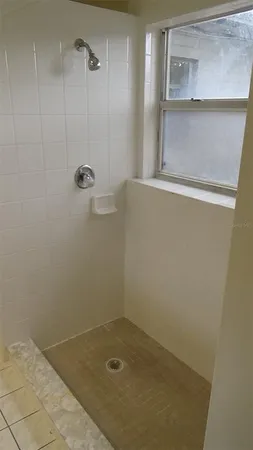 a view of a glass door and a window