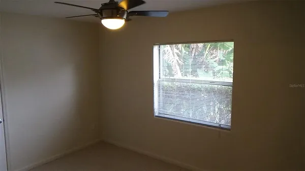 a view of a door and a window