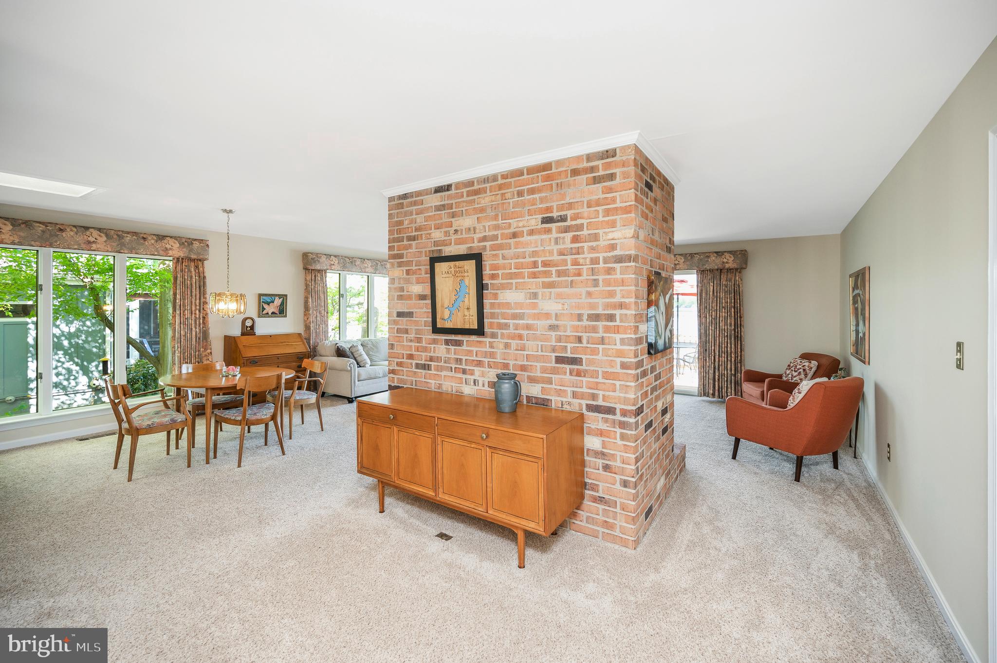 126 Greenspring Road Locust Grove, VA 22508 - Photo 14 of 90 view of dining area & brick wall divider