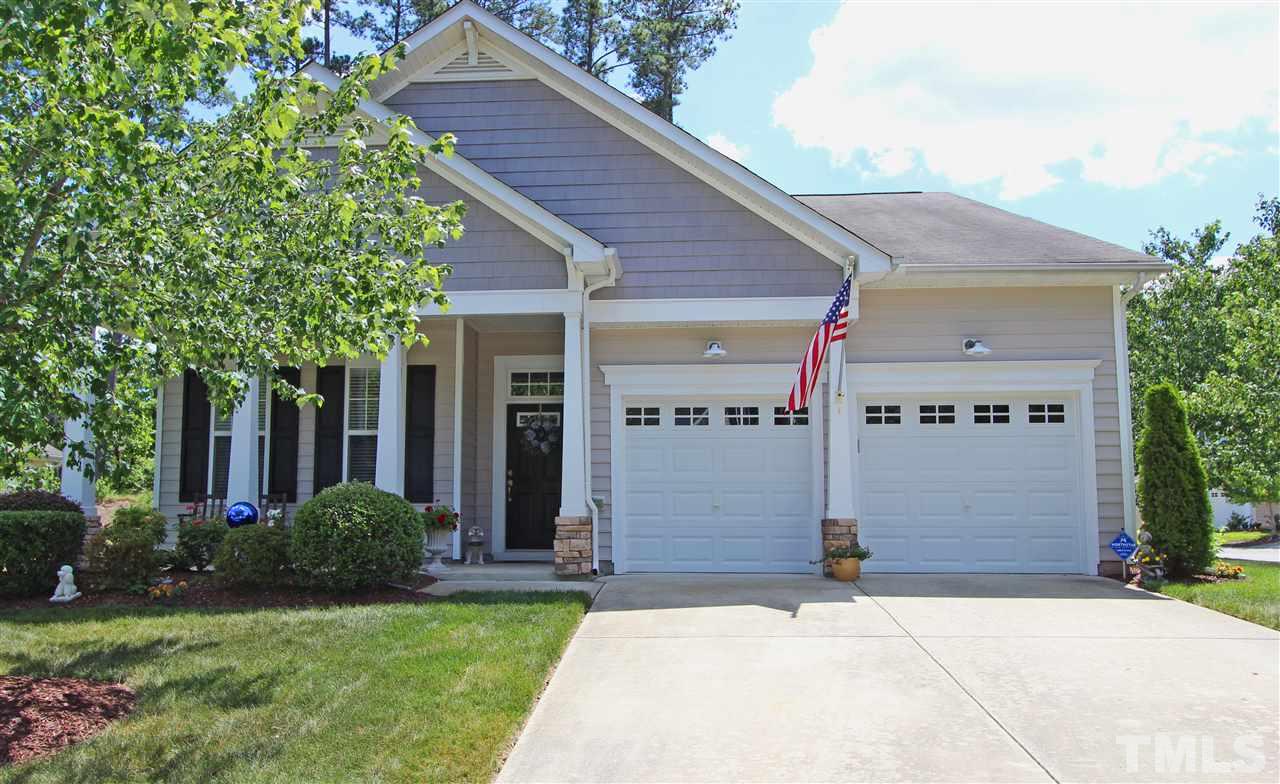 3402 Ranbir Drive Durham, NC 27713 - Photo 1 of 24 a front view of a house with garden