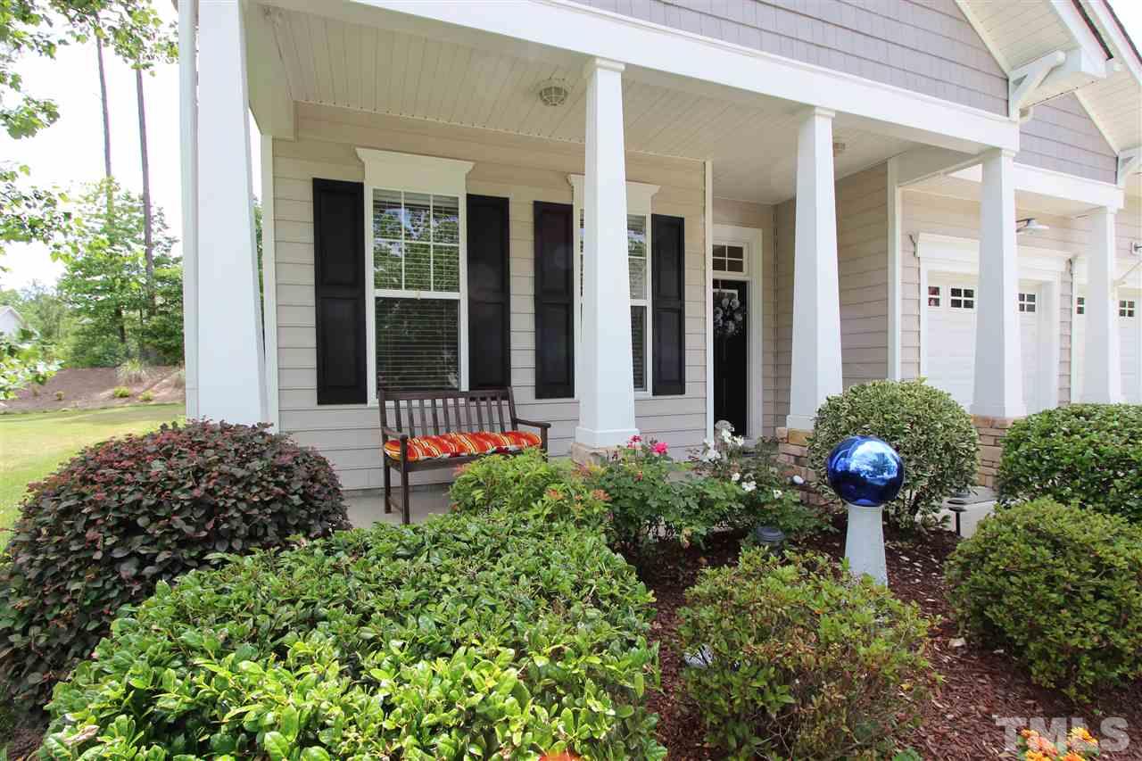 3402 Ranbir Drive Durham, NC 27713 - Photo 2 of 24 front view of a house with potted plants