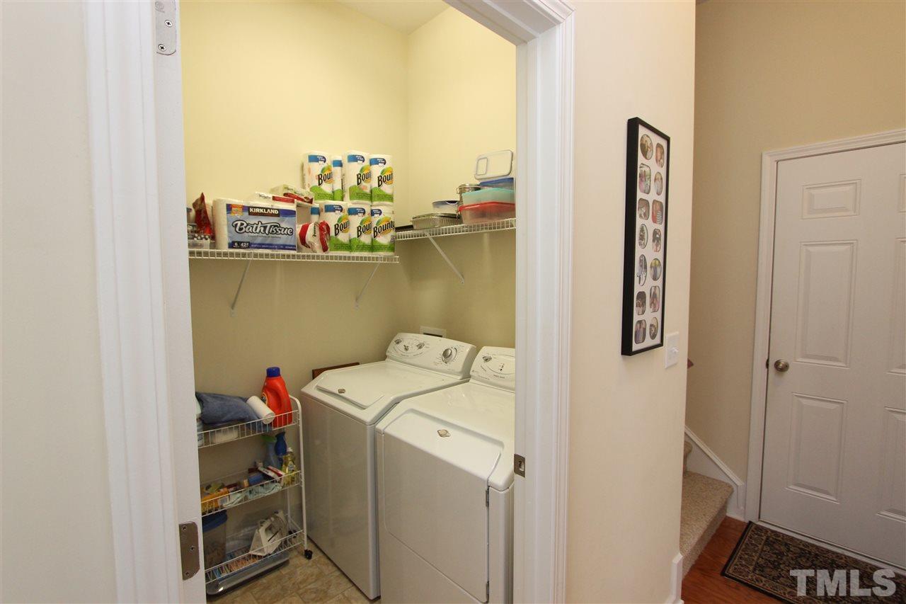 3402 Ranbir Drive Durham, NC 27713 - Photo 16 of 24 a utility room with dryer and washer