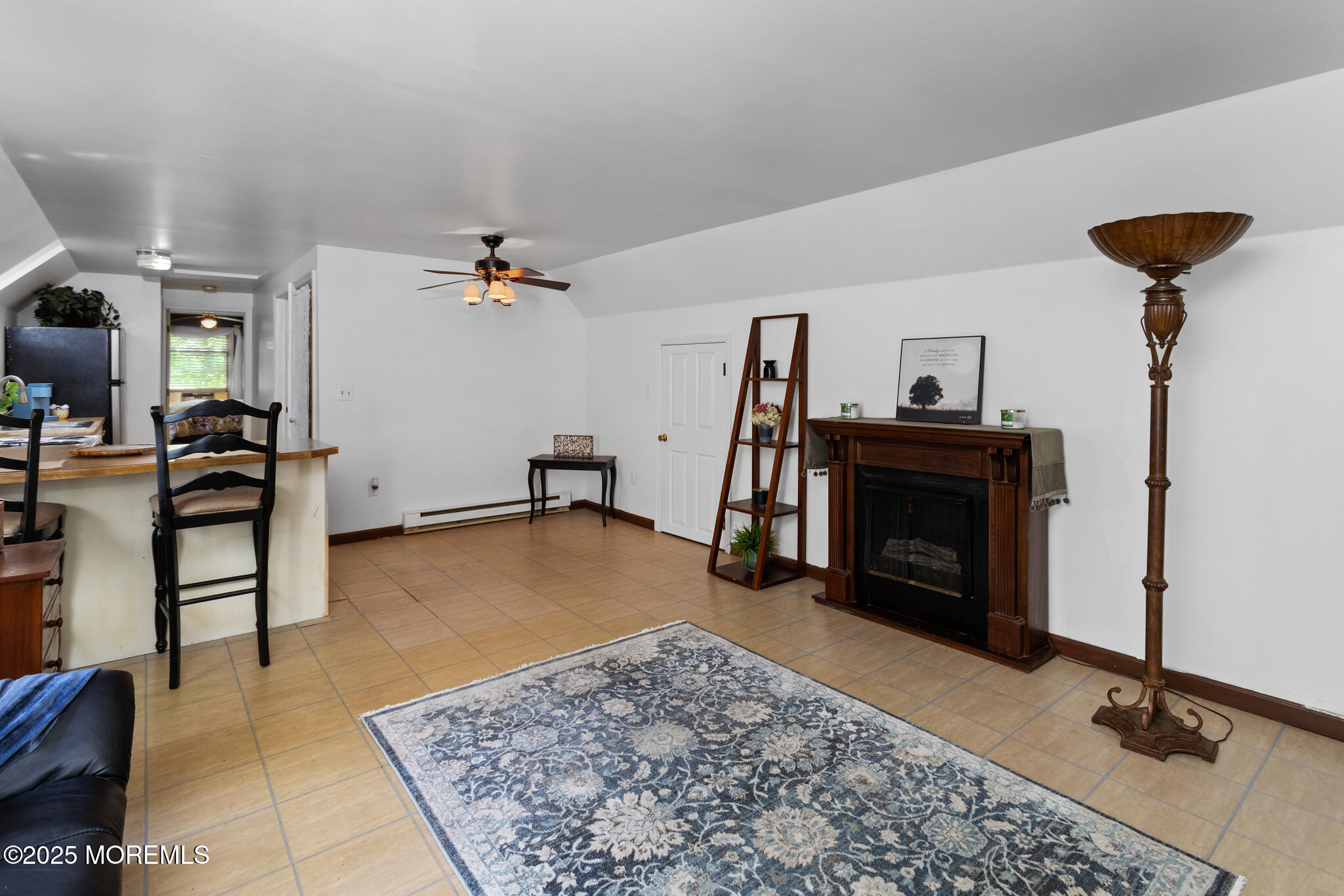 47 East Pleasant Grove Road Jackson, NJ 08527 - Photo 20 of 44 a living room with furniture and a fireplace