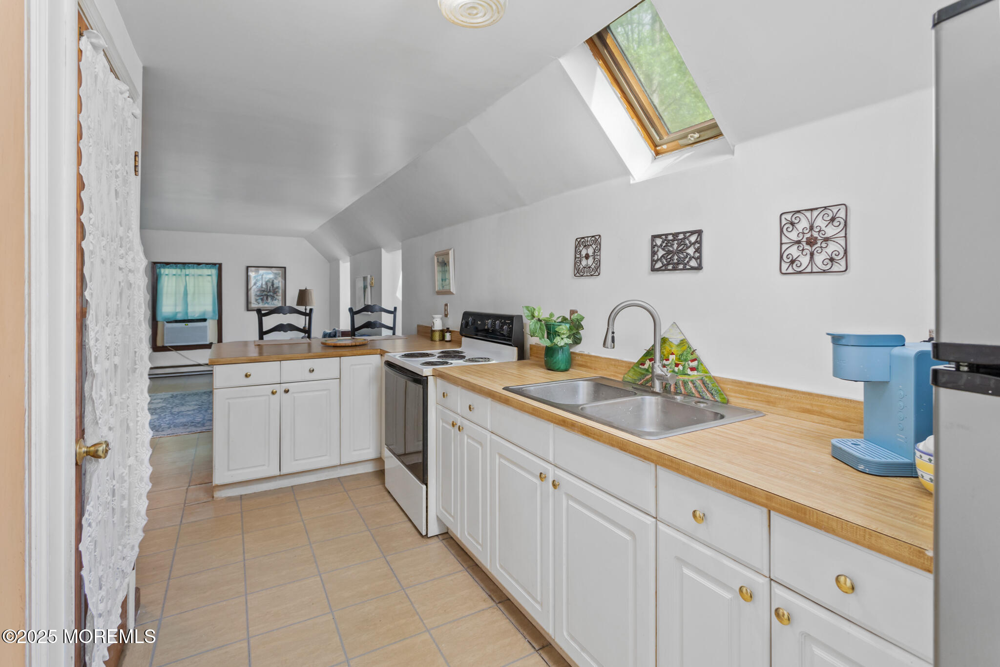 47 East Pleasant Grove Road Jackson, NJ 08527 - Photo 21 of 44 a kitchen with sink and cabinets