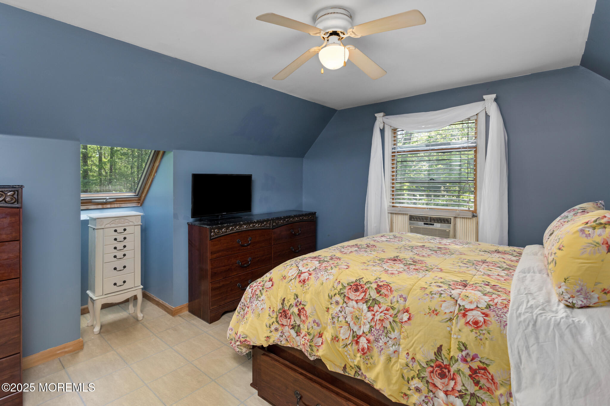 47 East Pleasant Grove Road Jackson, NJ 08527 - Photo 24 of 44 a bedroom with a bed and a flat screen tv