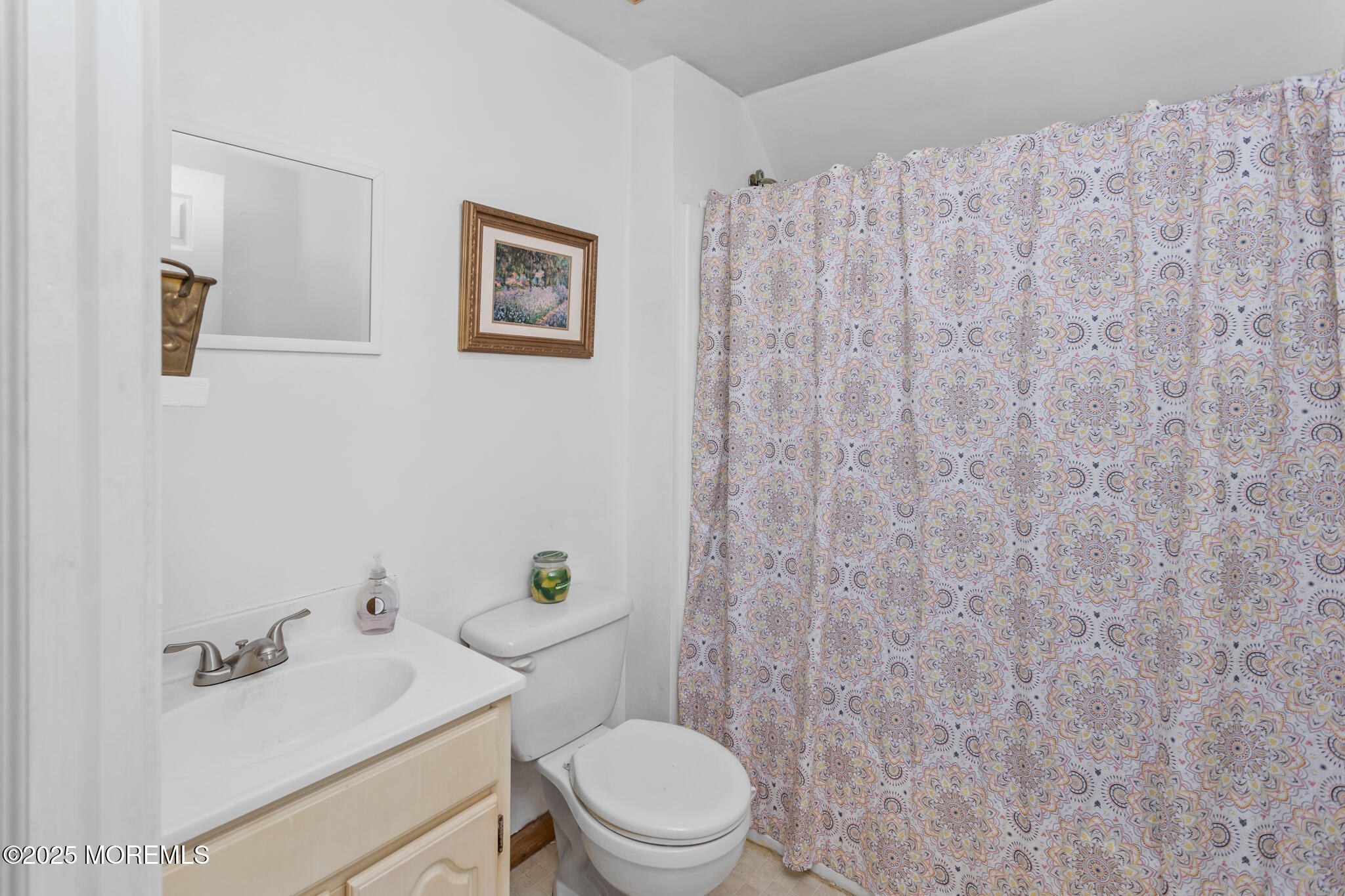 47 East Pleasant Grove Road Jackson, NJ 08527 - Photo 25 of 44 a white toilet sitting next to a bathroom sink