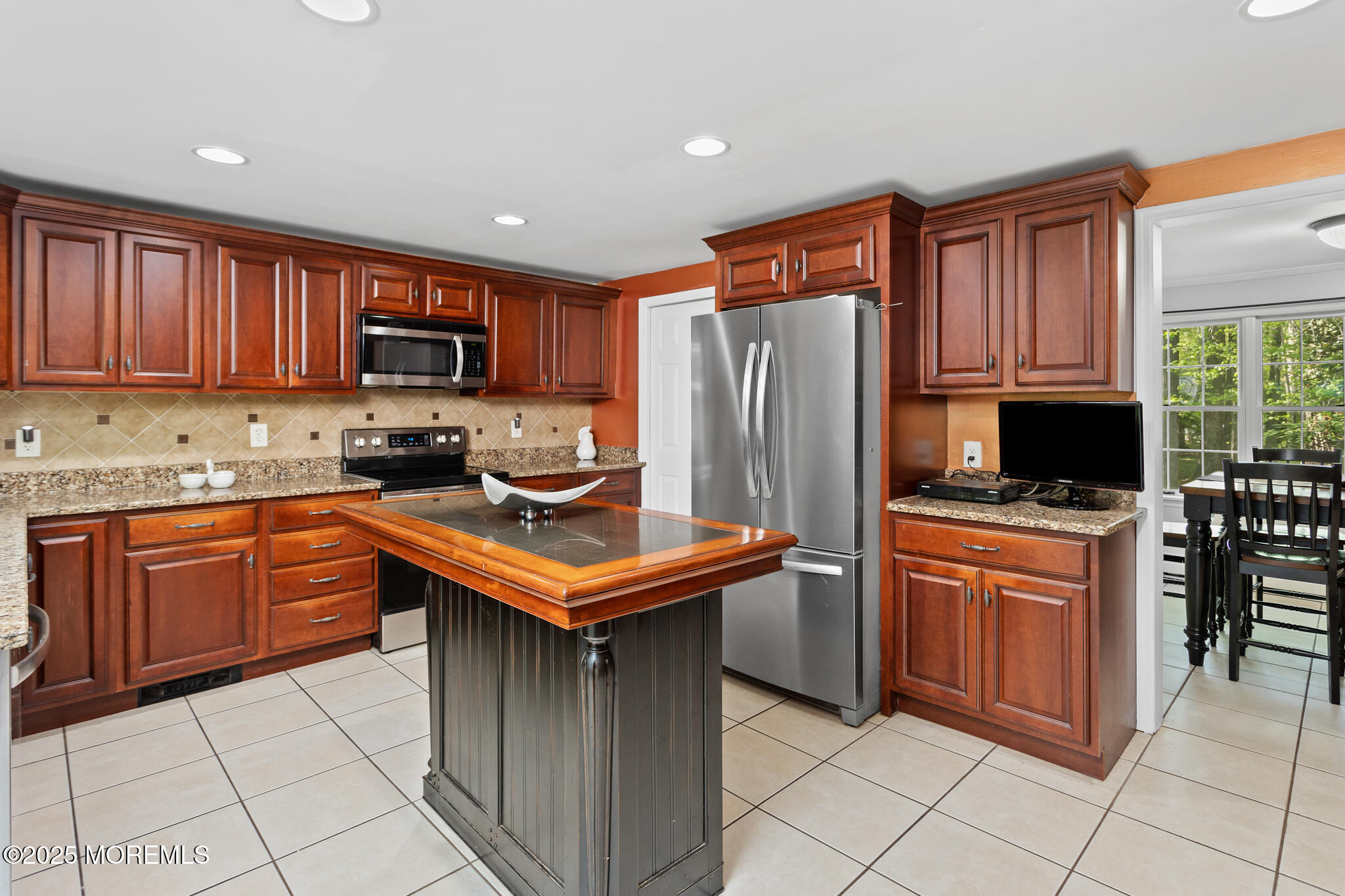 47 East Pleasant Grove Road Jackson, NJ 08527 - Photo 3 of 44 a kitchen with stainless steel appliances granite countertop wooden cabinets a stove top oven a sink and dishwasher