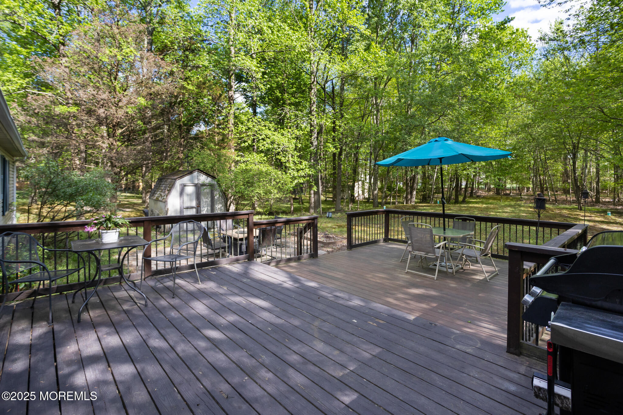 47 East Pleasant Grove Road Jackson, NJ 08527 - Photo 36 of 44 a view of a house with wooden deck and furniture