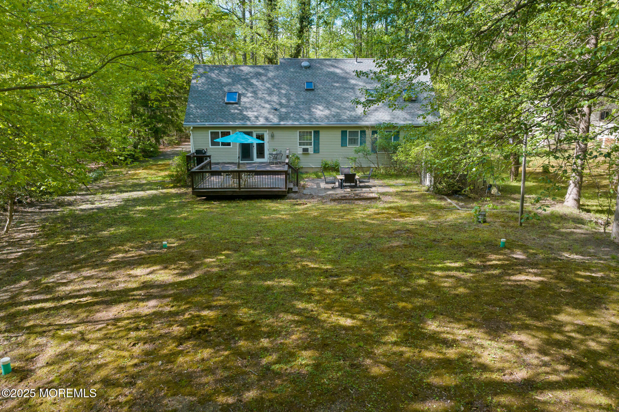 47 East Pleasant Grove Road Jackson, NJ 08527 - Photo 41 of 44 a view of a house with a backyard