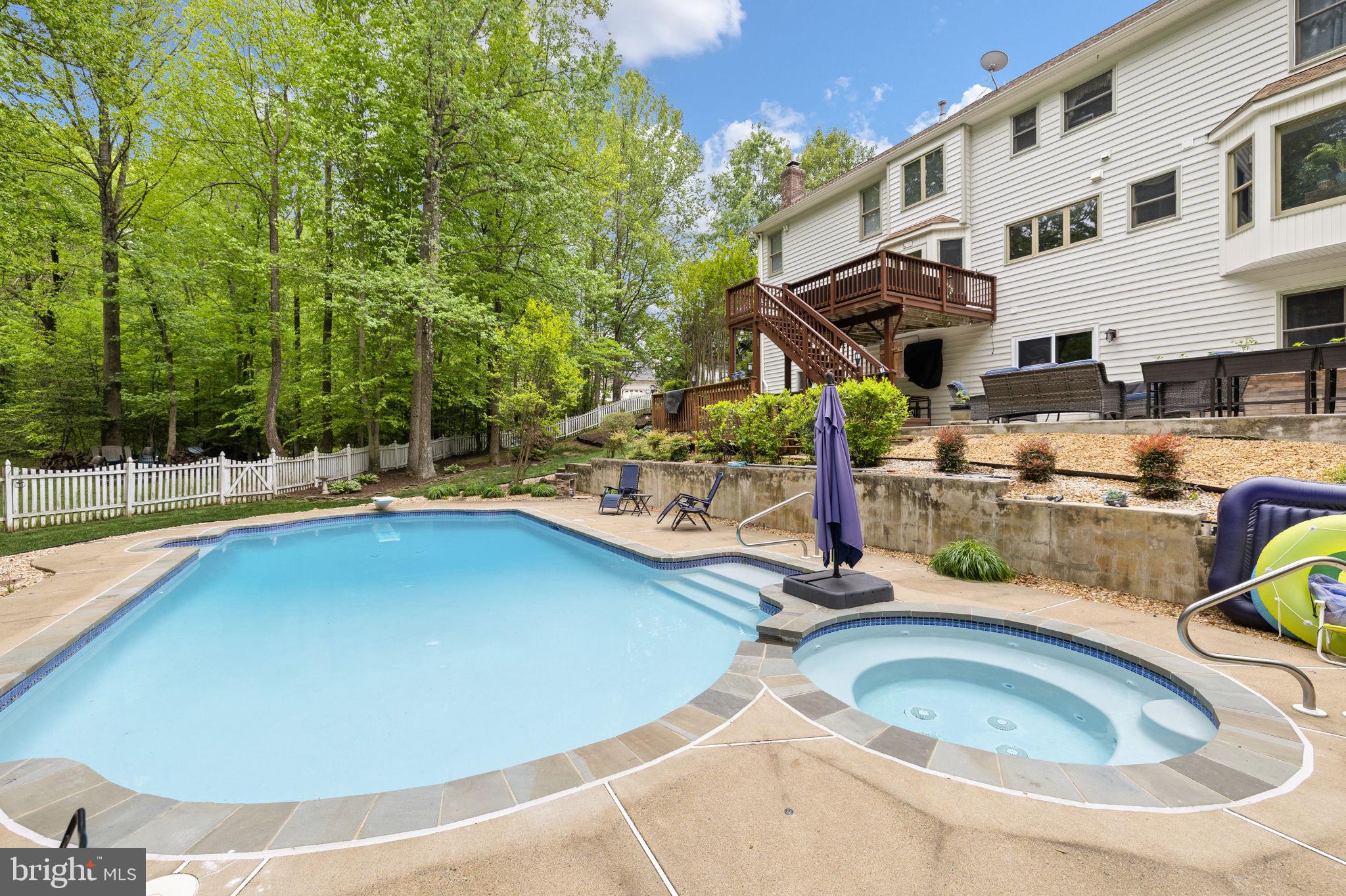 100 Boscobel Road Fredericksburg, VA 22405 - Photo 5 of 67 a swimming pool with outdoor seating and yard