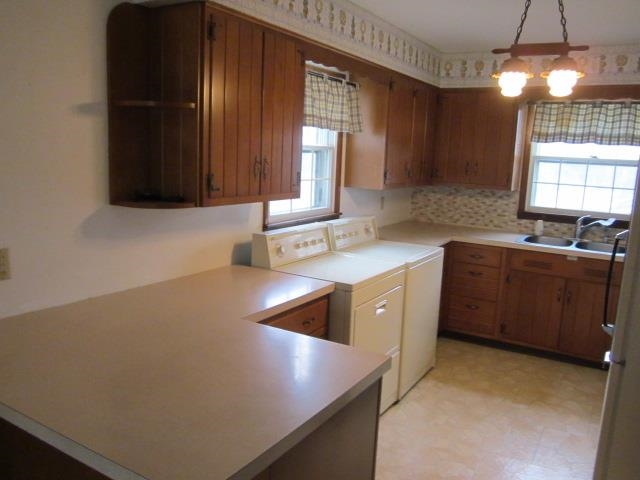 8141 Us Rte 20 West Lena, IL 61048 - Photo 13 of 22 a kitchen with sink cabinets and window