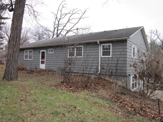 8141 Us Rte 20 West Lena, IL 61048 - Photo 3 of 22 a backyard of a house with lots of green space