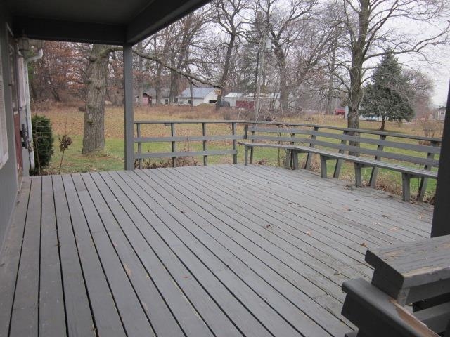 8141 Us Rte 20 West Lena, IL 61048 - Photo 8 of 22 a view of backyard with a deck and wooden floor