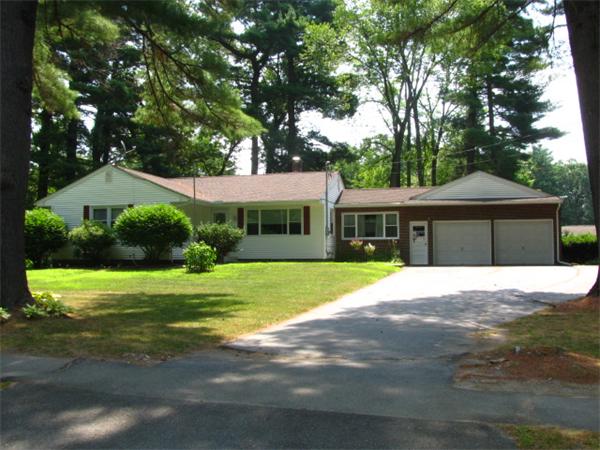 584 Ryan Road Northampton, MA 01062 - Photo 1 of 29 a front view of a house with a yard and garage