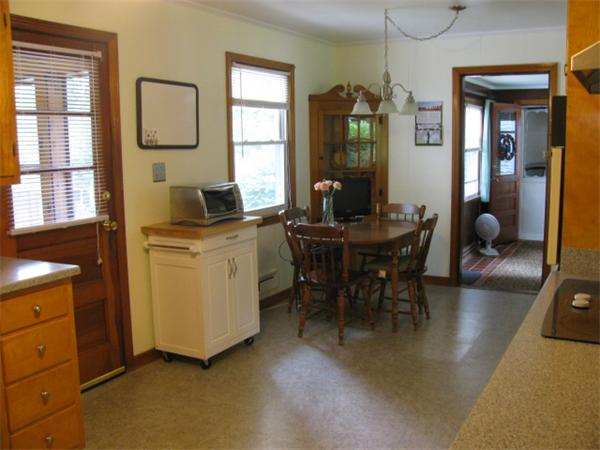 584 Ryan Road Northampton, MA 01062 - Photo 17 of 29 a view of a dining room with furniture and window