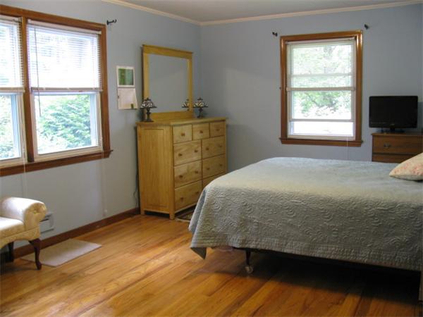 584 Ryan Road Northampton, MA 01062 - Photo 24 of 29 a bedroom with a bed and a window