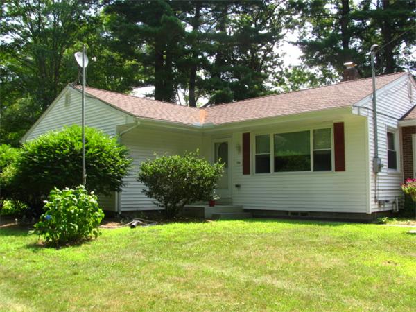 584 Ryan Road Northampton, MA 01062 - Photo 3 of 29 a front view of a house with a yard