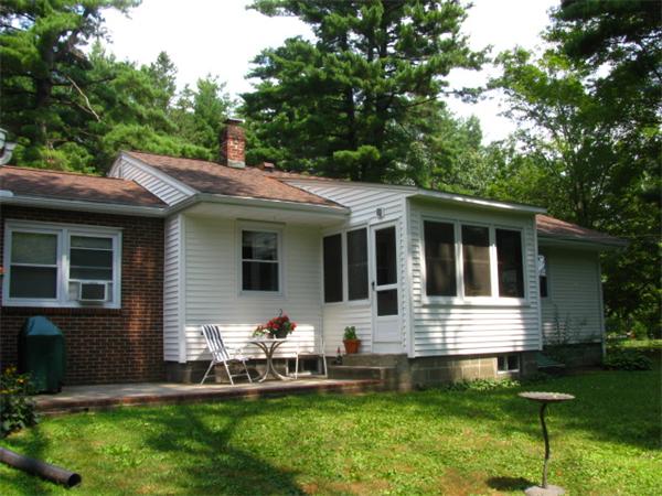 584 Ryan Road Northampton, MA 01062 - Photo 5 of 29 a front view of house with yard and green space