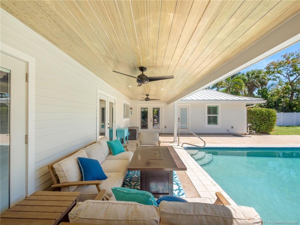 1318 Southeast Riverside Drive Stuart, FL 34996 - Photo 24 of 29 a outdoor space with patio furniture