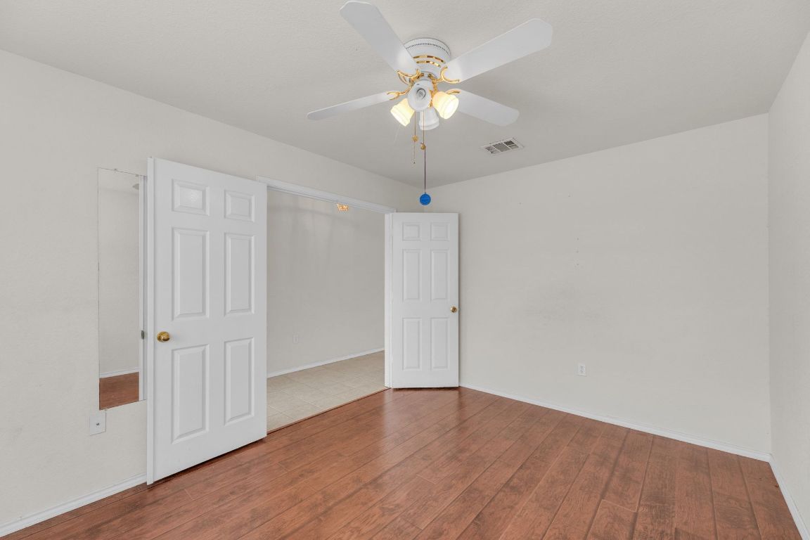 2317 Chestnut Path Round Rock, TX 78664 - Photo 26 of 36 Spare room with wood finished floors and a ceiling fan