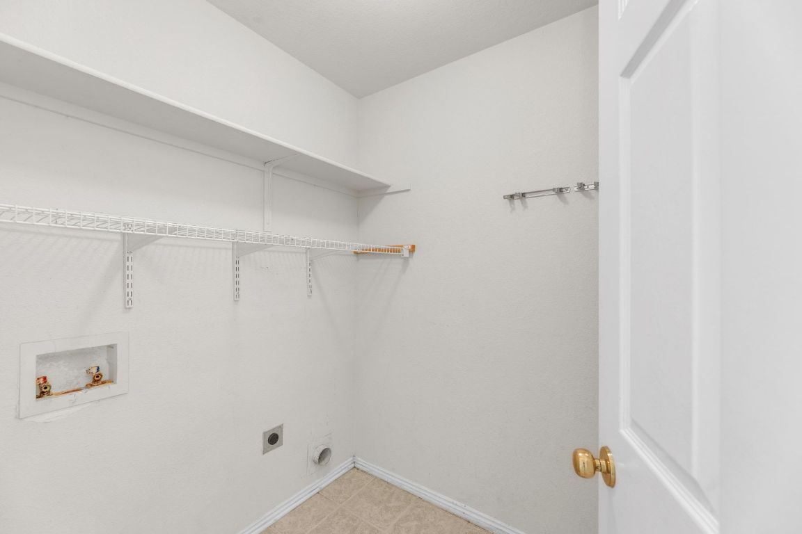 2317 Chestnut Path Round Rock, TX 78664 - Photo 32 of 36 Laundry area with hookup for a washing machine and electric dryer hookup