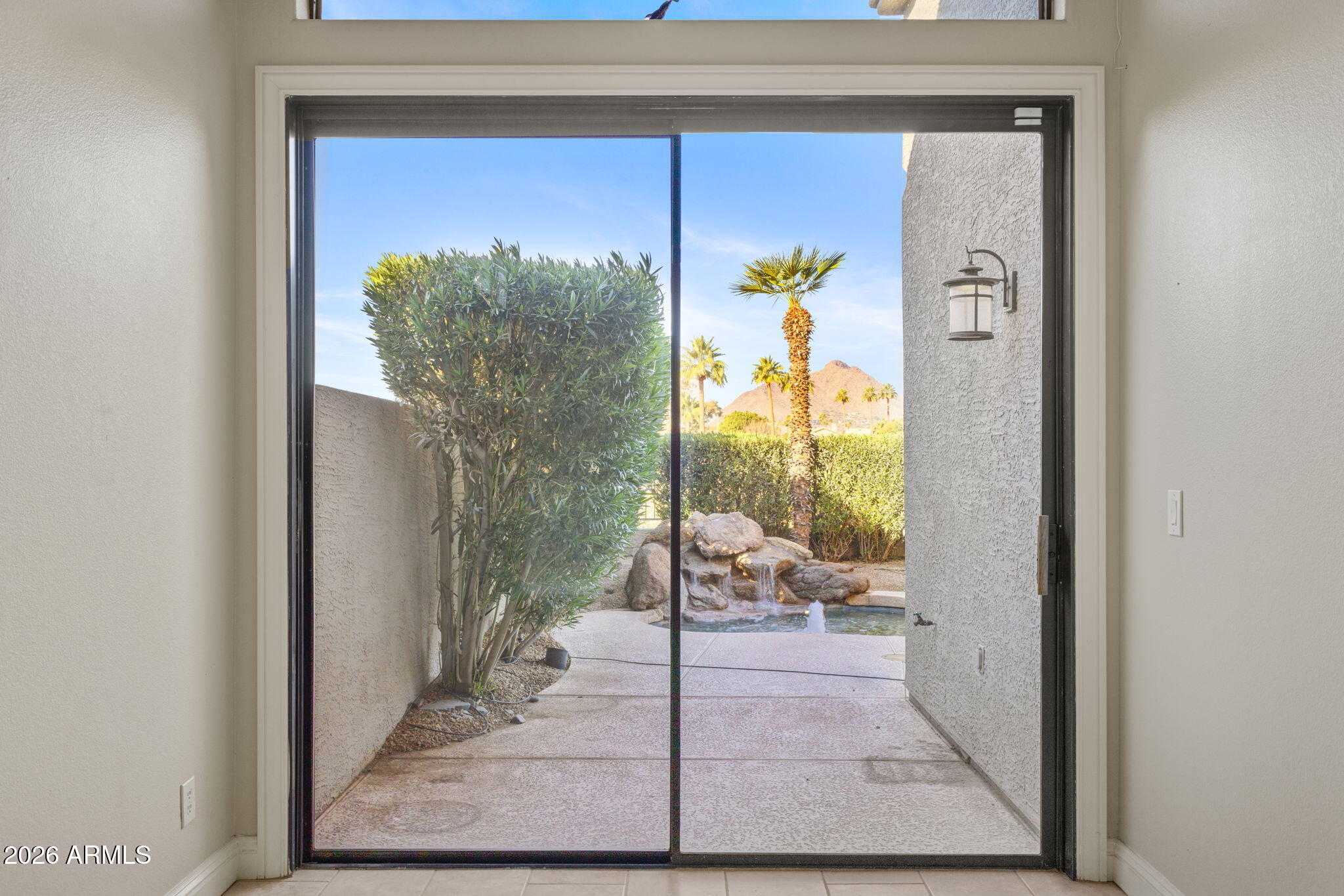 8100 East Camelback Road, Unit 43 Scottsdale, AZ 85251 - Photo 20 of 52 a view of a entryway door front of a house