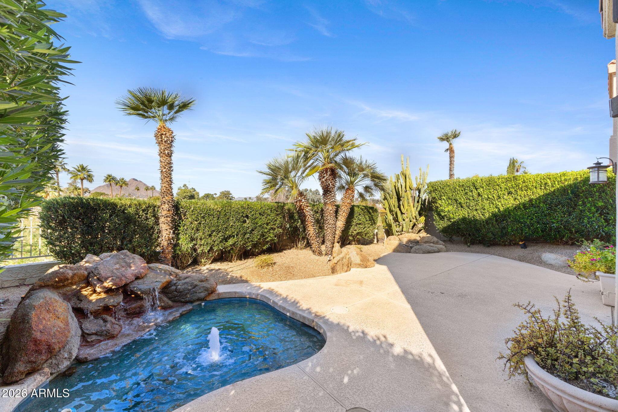 8100 East Camelback Road, Unit 43 Scottsdale, AZ 85251 - Photo 39 of 52 a view of a terrace with a garden