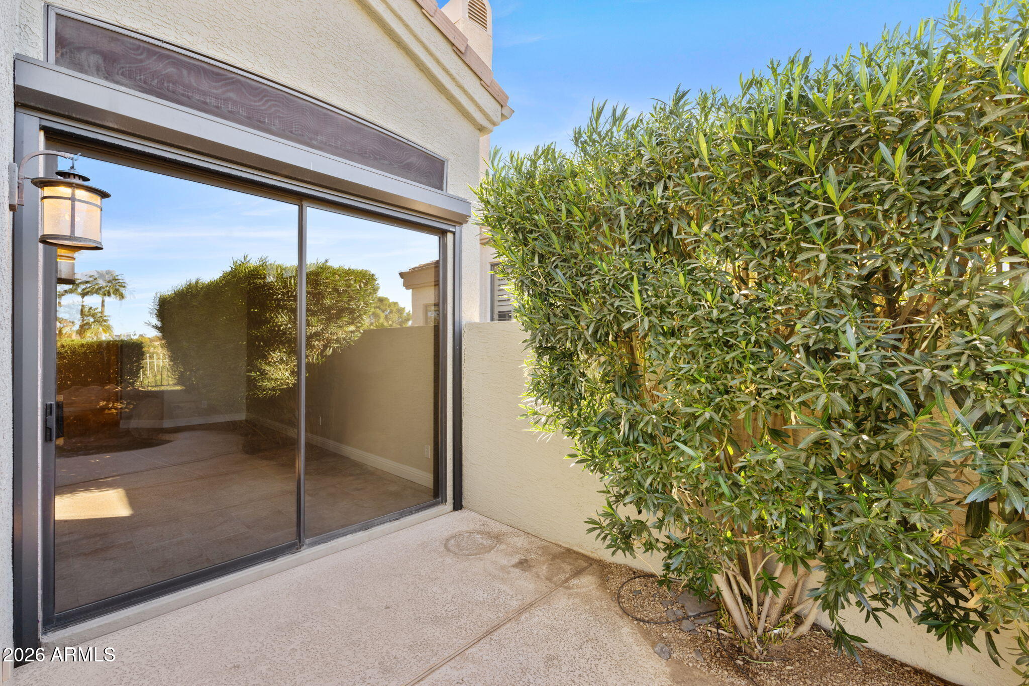 8100 East Camelback Road, Unit 43 Scottsdale, AZ 85251 - Photo 41 of 52 a view of a glass door and a window