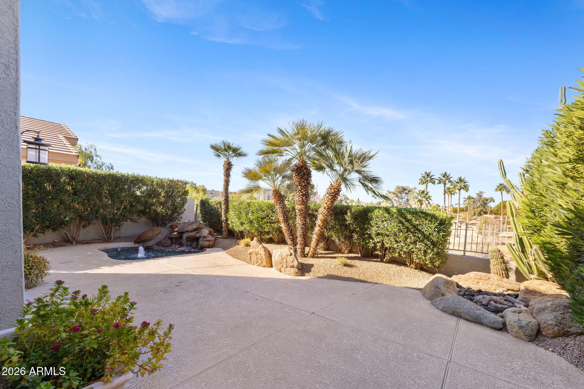 8100 East Camelback Road, Unit 43 Scottsdale, AZ 85251 - Photo 42 of 52 a view of potted plants and palm trees
