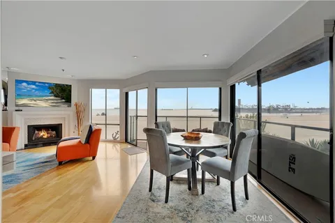 a kitchen with stainless steel appliances a refrigerator sink and microwave